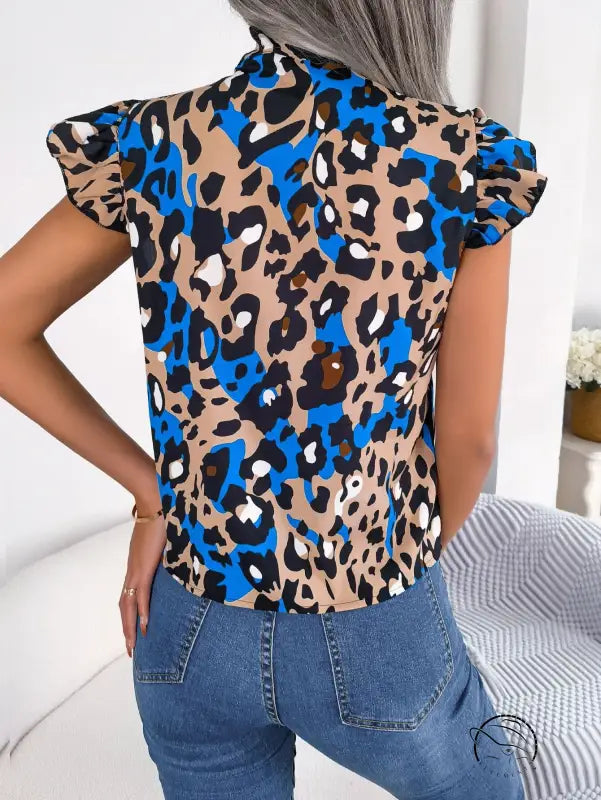 Casual leopard print blouse top in blue, black, and tan