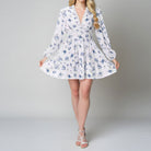 White floral print mini dress from Sweet Elegance, perfect for fashionable ملابس
