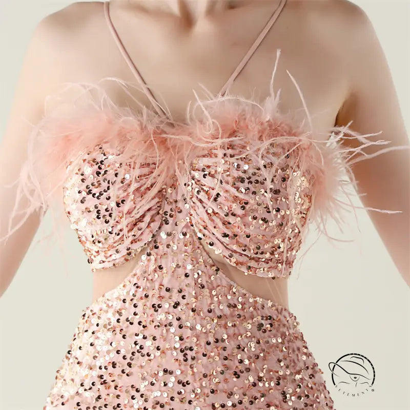 Langry rose gold sequined evening dress with ostrich feather accents and sweetheart neckline in fashion ملابس
