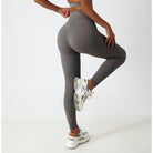 Gray athletic leggings with white sneakers in Breathable Cloud Feeling High Waist Yoga Pants