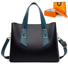 Langry high grade soft leather handbag with teal accents and silver hardware