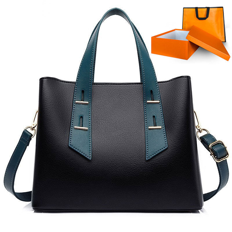 Langry high grade soft leather handbag with teal accents and silver hardware