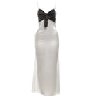 Elegant langry white satin slip dress with black lace and bow