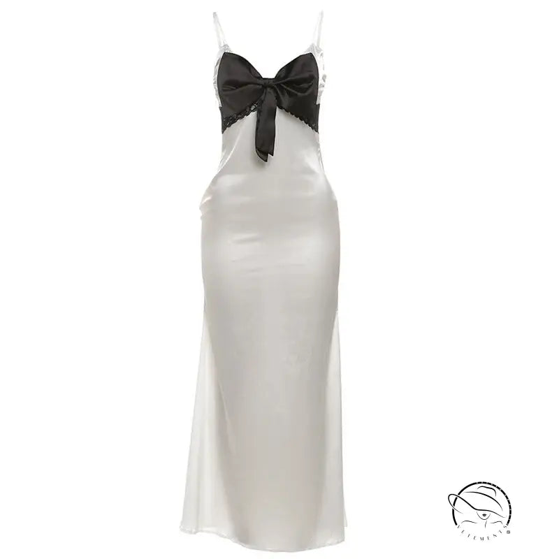 Elegant langry white satin slip dress with black lace and bow details