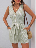 Sleeveless green and white striped romper with v-neck, pockets, and waist tie for summer fashion