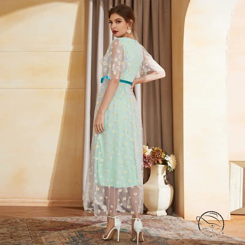 Enchanting high waist A-line fairy dress in mint green with daisy embroidery