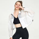 Woman in white translucent cropped jacket, ideal for Langry fashion and ملابس fitness