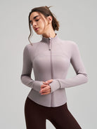 Long sleeve lavender yoga jacket with ribbed cuffs, stretchy fabric