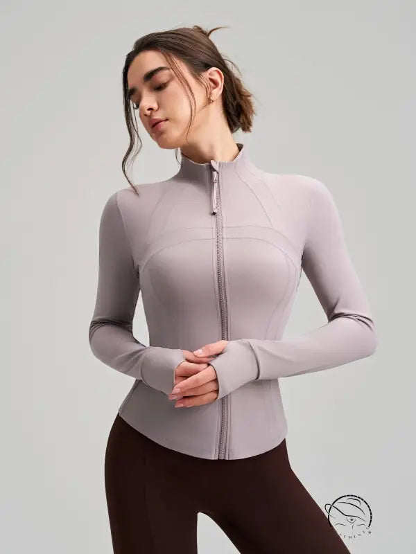 Lavender long sleeve yoga jacket with finger stall, ribbed cuffs, stretchy fabric