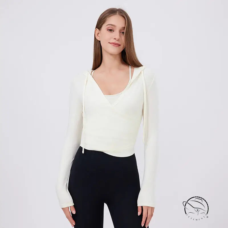 Cream-colored slim fit slimming hoodie top with V-neck and drawstring hood