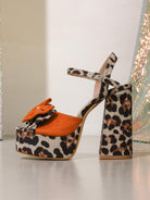 Langry fashion leopard print platform heels with orange bow accents