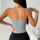 Langry fashion black and white checkered strapless top with gold chain necklace