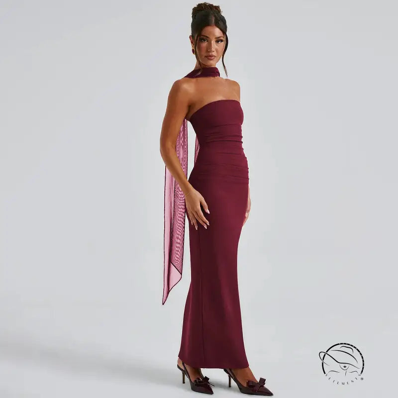 Burgundy strapless langry fashion gown with sheer scarf for winter evenings