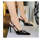 Langry classy high heels: black patent leather sandals with rhinestone buckle