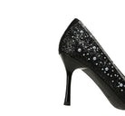 Langry black glitter stiletto pumps with pearl bowknot accents