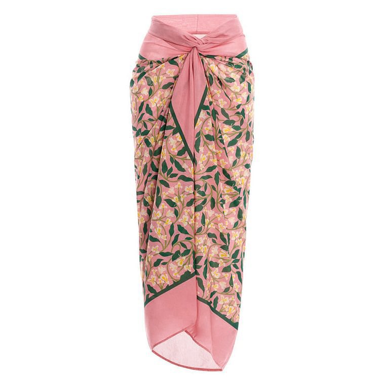 Pink floral sarong with tie waist and leaf pattern for a trendy swimsuit outfit fashion