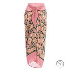 Pink floral sarong with tie waist and leaf pattern in cute bikini split swimsuit outfit