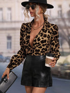Casual leopard print long-sleeved langry fashion top with black leather skirt and hat