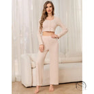 Woman in ribbed knit crop top and pants, winter casual two piece pajamas
