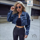 Woman in matching denim short coat with distressed cropped jacket, black top, pleather pants