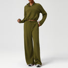Langry olive green jumpsuit with long sleeves, pockets, stretchy fabric