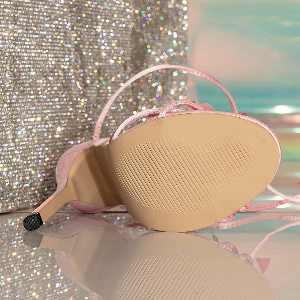 Langry fashion nude stiletto heel with pink ribbon and black tip