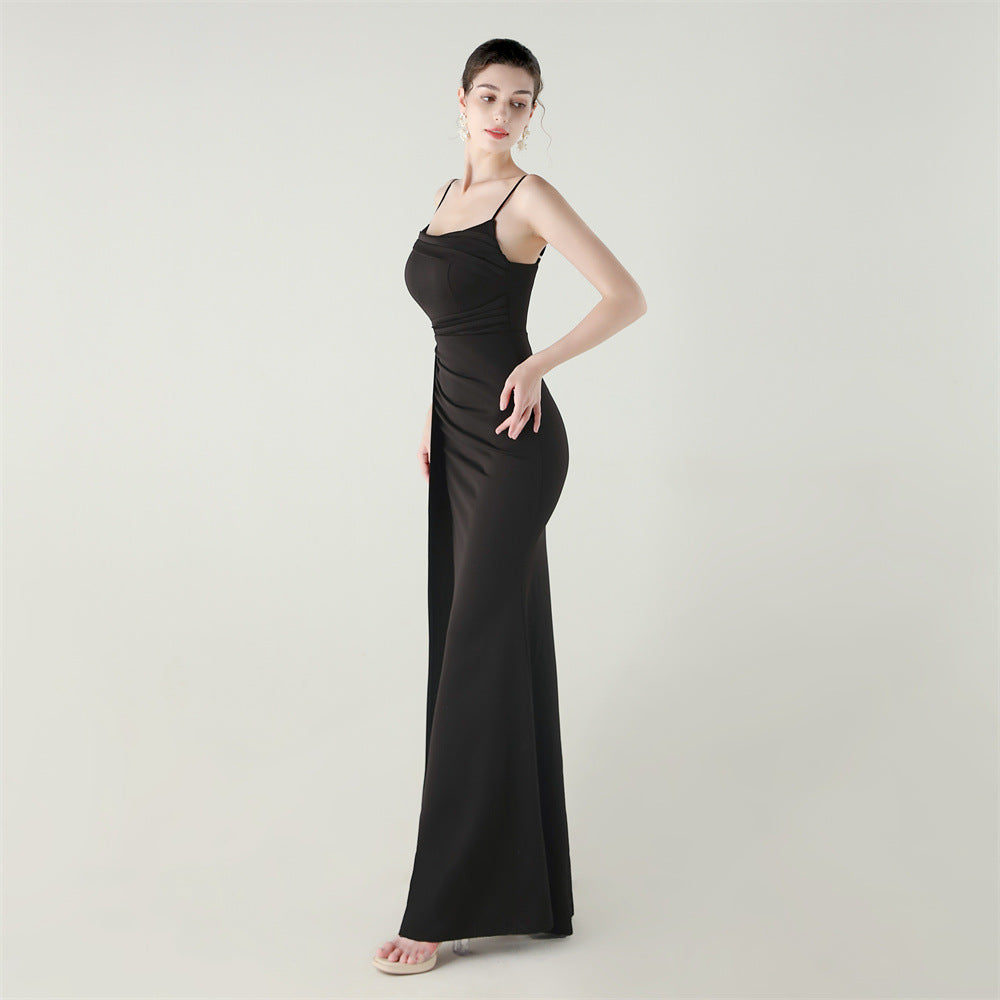 Elegant black satin slip dress with spaghetti straps and high slit