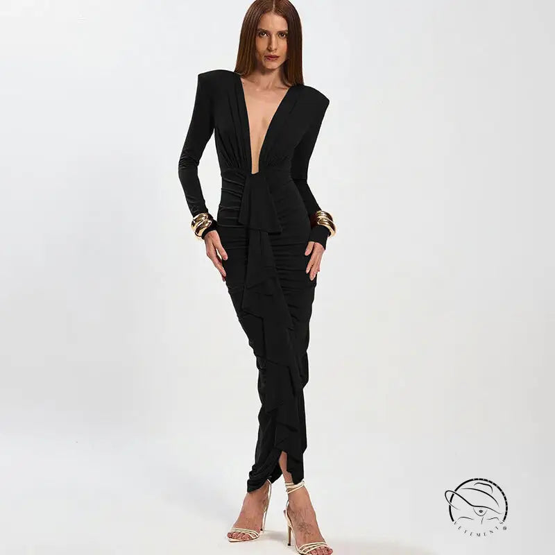 Elegant slim evening dress: black ruched fashion with gold accents and long sleeves