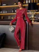 Woman in sparkly red elegant retro high waist jumpsuit