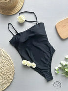 Black enchanting beach swimwear: one-piece with thin straps