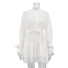 Delicate white long sleeve French Tie Ruffled dress with lace cuffs