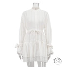 Delicate white long sleeve French Tie ruffled dress with lace cuffs
