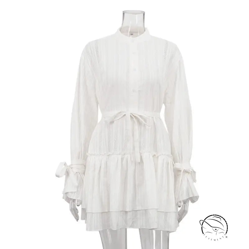 Delicate white long sleeve French Tie ruffled dress with lace cuffs
