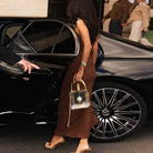 Elegant Langry fashion dress with clear skull handbag chain and gold hardware