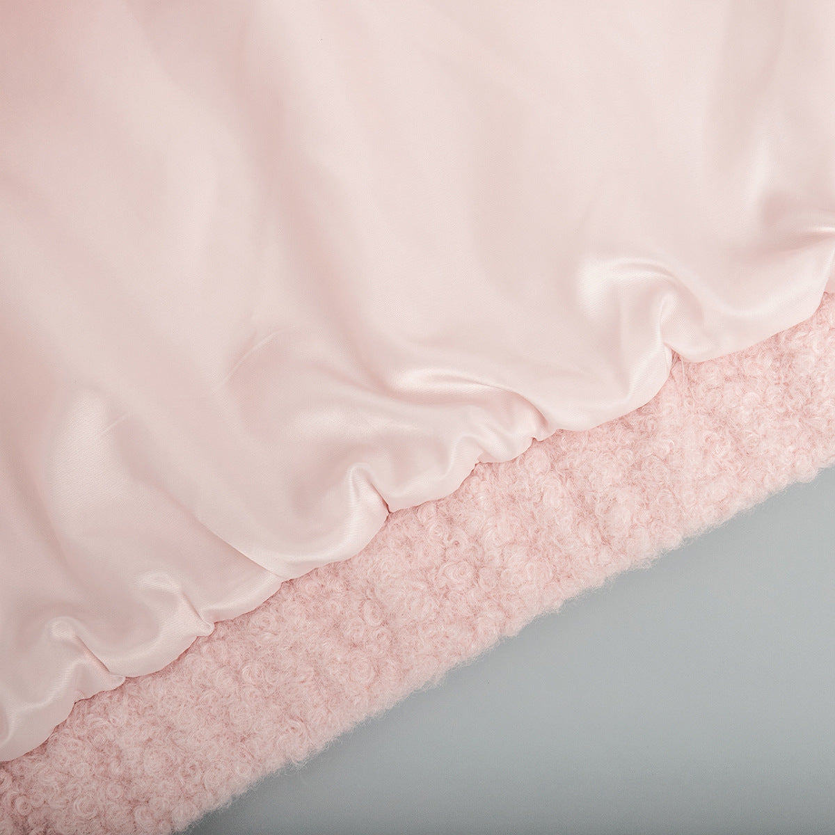 Pink short furry satin blanket displayed with the Pink Short Furry Coat for luxurious comfort