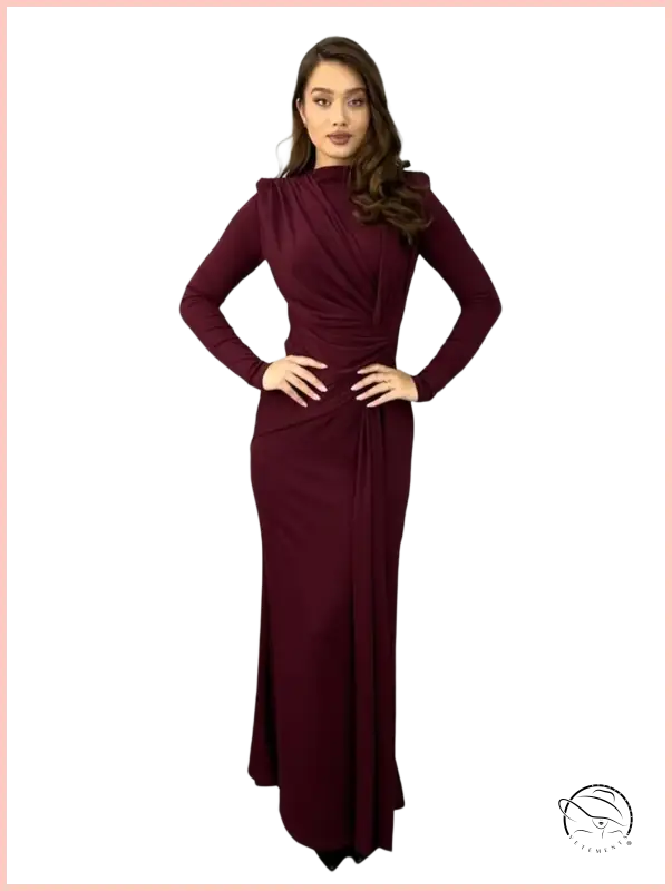 Sleek maroon maxi dress with high neckline and draped waist detailing