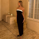 Elegant black and white strapless dress from Langry, perfect for sophisticated fashion choices