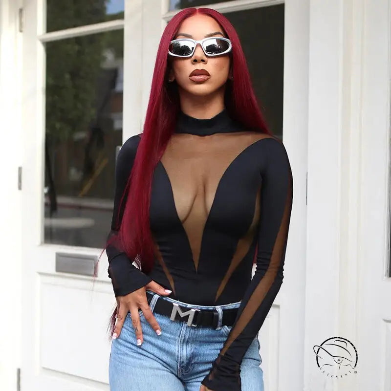 Woman in black mesh stitching high waist long sleeves jumpsuit