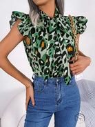 Casual leopard print blouse with pussy bow neckline and blue jeans