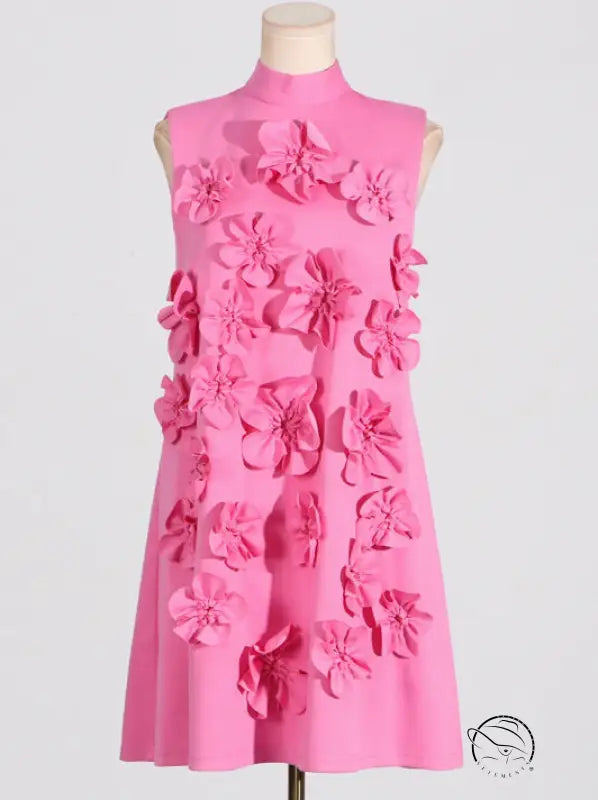 Pink retro sleeveless dress with tie bow and floral embellishments