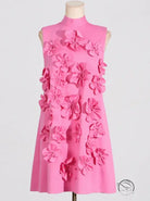 Pink retro sleeveless dress with tie bow and floral embellishments