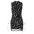 Black and white polka dot mesh sheath dress with sheer sleeves