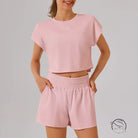 Pink loose sports yoga fitness set with crop top and shorts