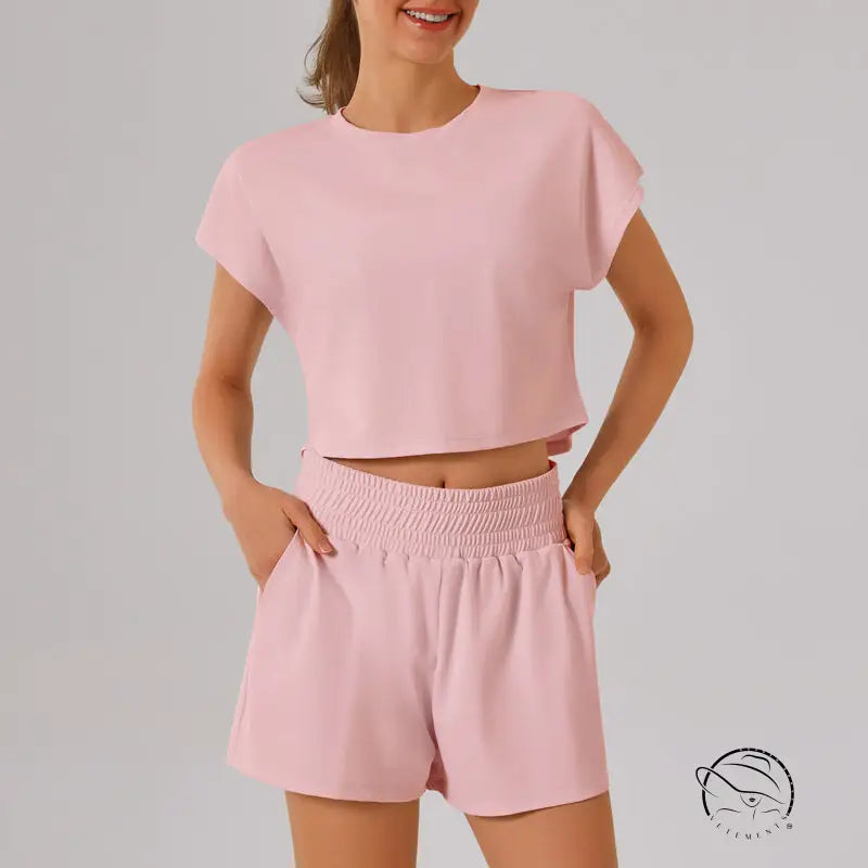 Pink loose sports yoga fitness set with crop top and shorts