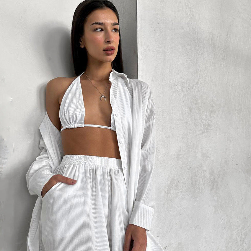 White halter neck bikini top with matching wide-leg pants and open shirt in comfort cotton loose pajamas