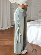 Casual wide leg jeans with light-wash denim and white lace-up seam design