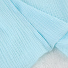Light blue textured fabric diaper in Langry cotton crepe pajamas