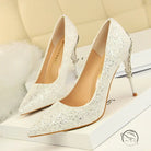 Elegant langry white glitter stiletto heels with bow and chain