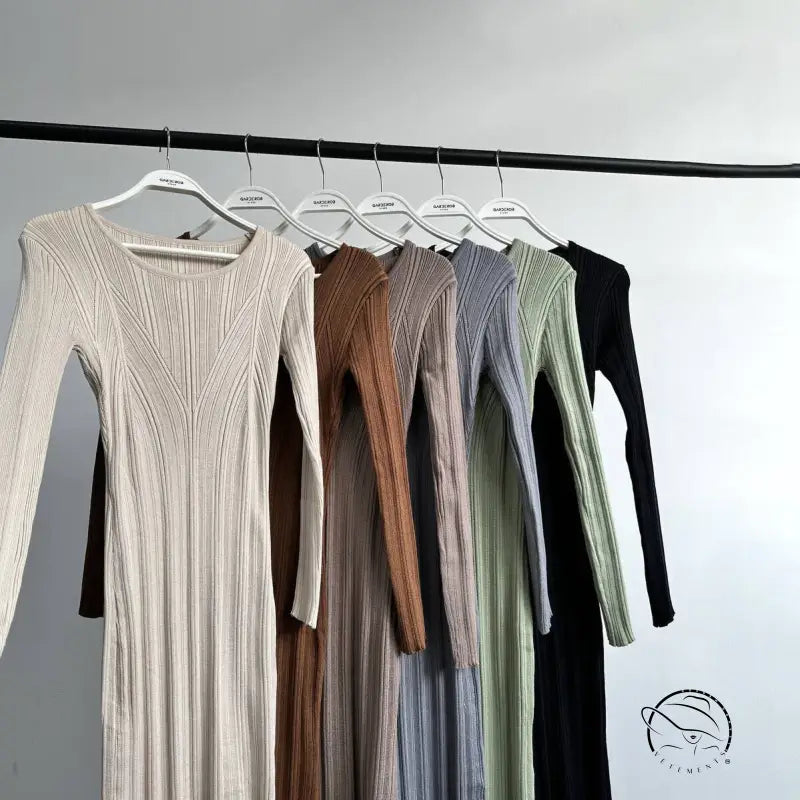 Row of beautiful langry ribbed knit dresses in fashion ملابس