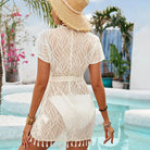 White lace romper with tassel trim showcasing short sleeve length in fashion for summer